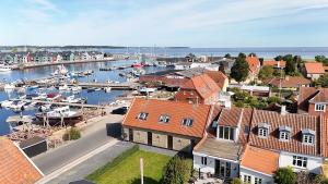 an aerial view of a harbor with boats in the water at Havnehuset Kerteminde in Kerteminde