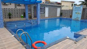 Bazén v ubytování Samriddha Beach Resort nebo v jeho okolí