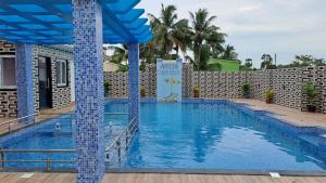 Bazén v ubytování Samriddha Beach Resort nebo v jeho okolí
