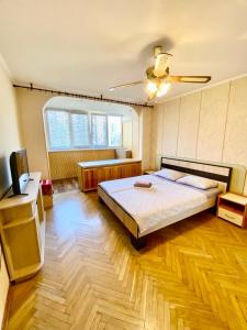 Postel nebo postele na pokoji v ubytování Апартаменти поруч з метро Лівобережна та МВЦ