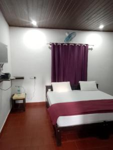 Posteľ alebo postele v izbe v ubytovaní Humble Nest Coorg