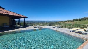 The swimming pool at or close to Casa Castella - Langhe