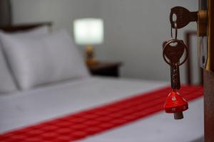 Postel nebo postele na pokoji v ubytování Lavender Resort