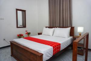 Postel nebo postele na pokoji v ubytování Lavender Resort