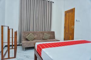 Postel nebo postele na pokoji v ubytování Lavender Resort