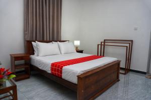 Postel nebo postele na pokoji v ubytování Lavender Resort