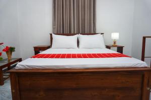 Postel nebo postele na pokoji v ubytování Lavender Resort