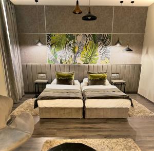 Posteľ alebo postele v izbe v ubytovaní Hotel Central