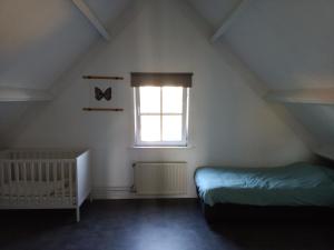 Postel nebo postele na pokoji v ubytování 't Zijper Eilant 98 + 29 fotografií