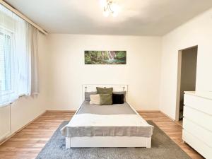 Postel nebo postele na pokoji v ubytování Ein perfekter Aufenthalt in Graz