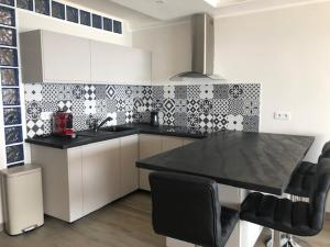 Una cocina o kitchenette en Eros