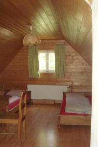 Postel nebo postele na pokoji v ubytování Beskýdek I