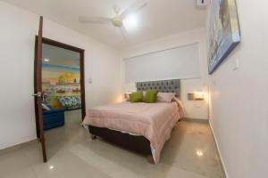 Ένα ή περισσότερα κρεβάτια σε δωμάτιο στο Casa Hotel La Niña Neyla +90 φωτογραφίες