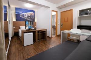 Kuchyň nebo kuchyňský kout v ubytování S4 Hotel Águas Claras