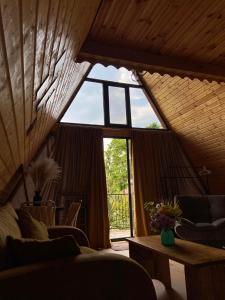 Posezení v ubytování Paradise cottage