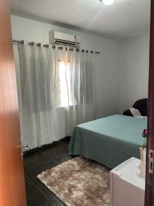 Postel nebo postele na pokoji v ubytování Aráras Suites + 12 fotografií