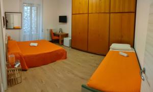 Postel nebo postele na pokoji v ubytování La Casa di Mimma