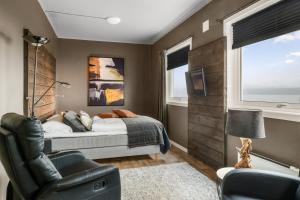 TV a/nebo společenská místnost v ubytování Fjord Hotel Alta