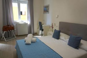 Postel nebo postele na pokoji v ubytování Pino Home + 10 fotografií