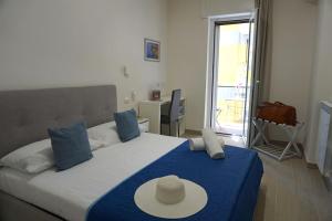 Postel nebo postele na pokoji v ubytování Pino Home