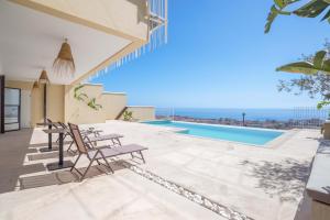 a villa with a view of the ocean at Spacious villa with great views! in Benalmádena