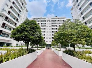 a walkway in front of a large white building at Modern Studio Suite at The Gallery in Accra