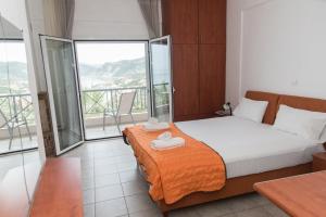 Postel nebo postele na pokoji v ubytování Panorama Hotel