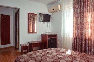 Postel nebo postele na pokoji v ubytování Pensiunea Belvedere