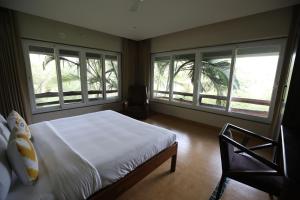 Golden Fields Resort 객실 침대