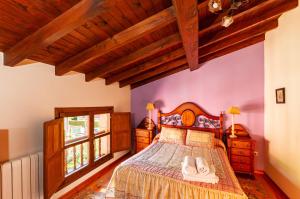 Postel nebo postele na pokoji v ubytování Casa Rural La Regoria