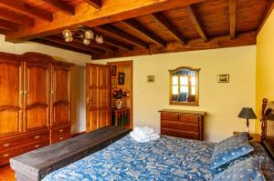 Postel nebo postele na pokoji v ubytování Casa Rural La Regoria