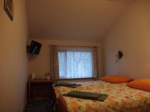 Postel nebo postele na pokoji v ubytování Parks Guest House