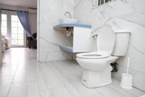 Kúpeľňa v ubytovaní Sugarmon Villas