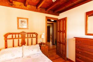 Postel nebo postele na pokoji v ubytování Casa Rural La Regoria