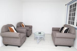 Posedenie v ubytovaní Sugarmon Villas