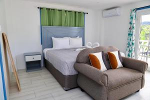 Posteľ alebo postele v izbe v ubytovaní Sugarmon Villas