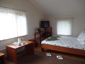 Postel nebo postele na pokoji v ubytování Parks Guest House