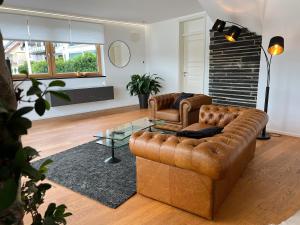 Posezení v ubytování Weingut-Aparthotel Olinger