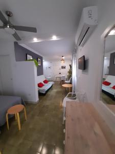 Postel nebo postele na pokoji v ubytování Estudio Carmen