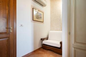 Кровать или кровати в номере Lola Piccolo Hotel e Appartamenti