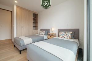 Katil atau katil-katil dalam bilik di Luxury 2 BR Condo in Condesa +39 gambar