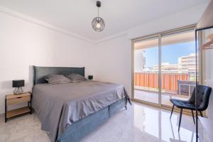 Ένα ή περισσότερα κρεβάτια σε δωμάτιο στο Spacieux 3 pièces avec piscine et tennis +14 φωτογραφίες