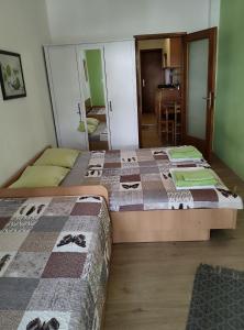 Posteľ alebo postele v izbe v ubytovaní Apartments Ani