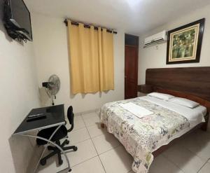 TV a/nebo společenská místnost v ubytování Tallan Hotel