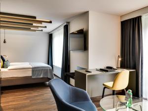 Postel nebo postele na pokoji v ubytování Park Hotel Zug
