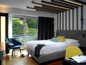 Postel nebo postele na pokoji v ubytování Park Hotel Zug + 37 fotografií