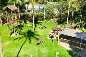 Κήπος έξω από το Camping & Cabanas Ilhabela
