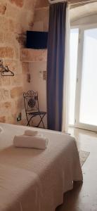 Postel nebo postele na pokoji v ubytování B&B Giada&Chiara