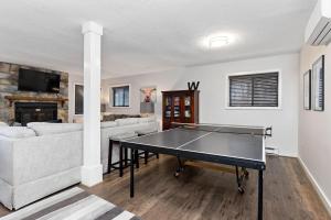 a living room with a ping pong table in it at Bull City Bungalow with Wintergreen Advantage in Wintergreen