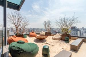 Photo de la galerie de l'établissement Prédio com rooftop e café da manhã ao lado da Faria Lima - JFL, à São Paulo